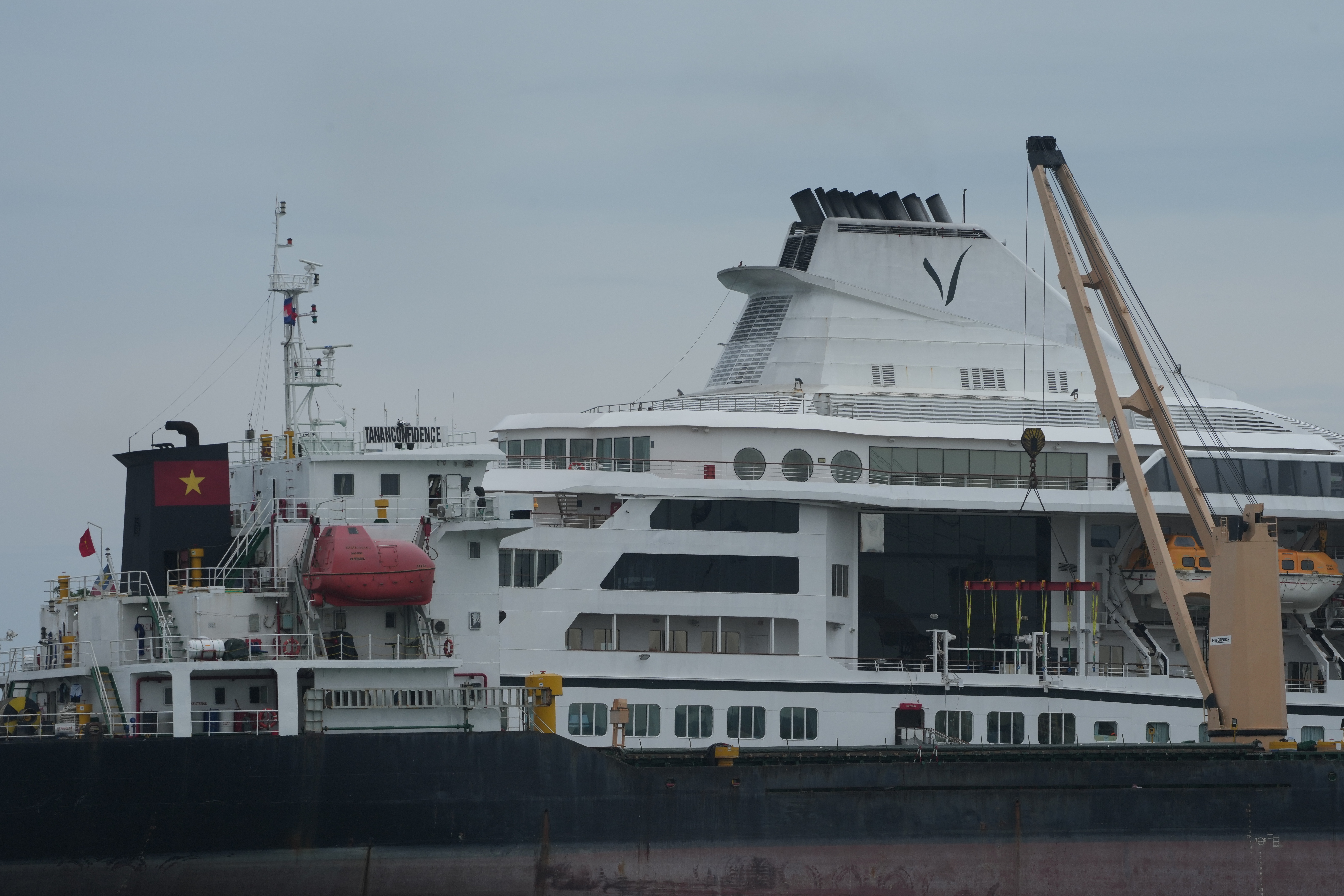 A US cruise ship suspends a global voyage in Asia due to fuel costs, stranding 200 passengers
