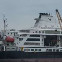 A US cruise ship suspends a global voyage in Asia due to fuel costs, stranding 200 passengers