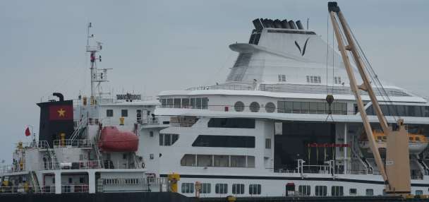 A US cruise ship suspends a global voyage in Asia due to fuel costs, stranding 200 passengers