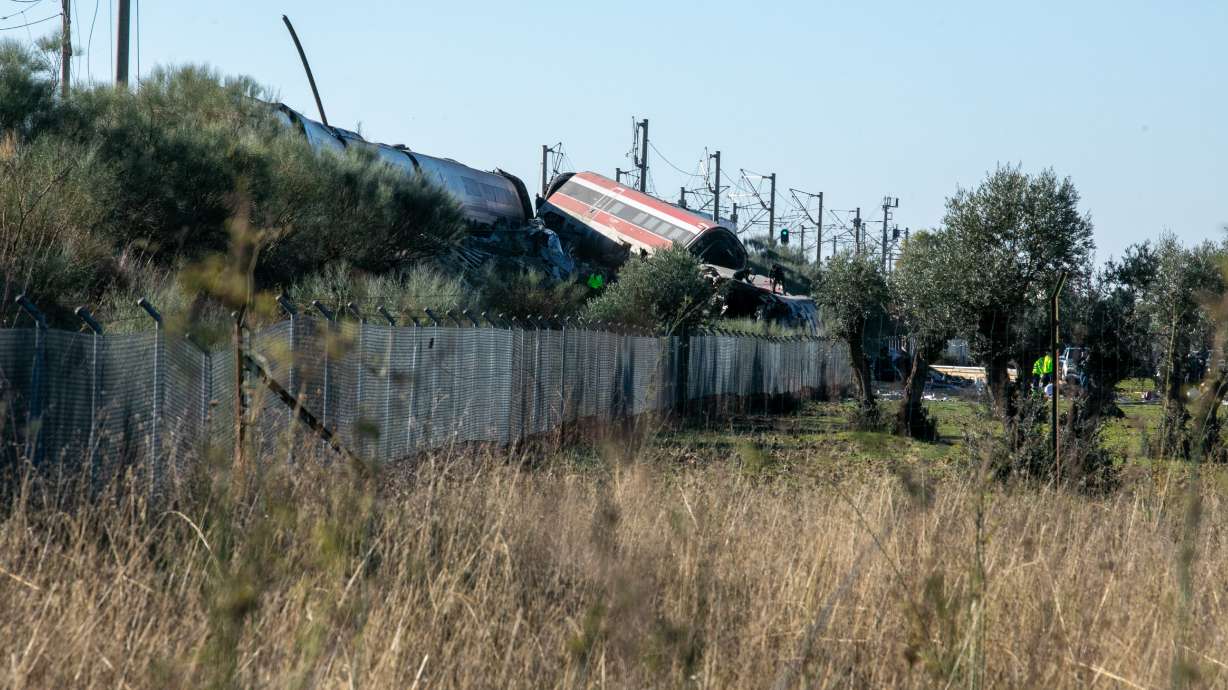 The scene of a collision between two trains in Urda, Spain, on Wednesday. Two cars were derailed, leading to at least 64 people being killed.