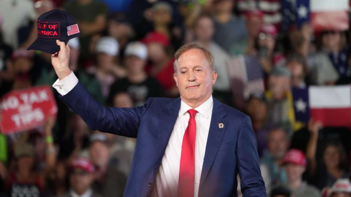 Republican U.S. Senate candidate and Texas Attorney General Ken Paxton speaks at a campaign rally, Tuesday, in Corpus Christi, Texas. The question of personality over policy has become elevated in the state's U.S. Senate race.
