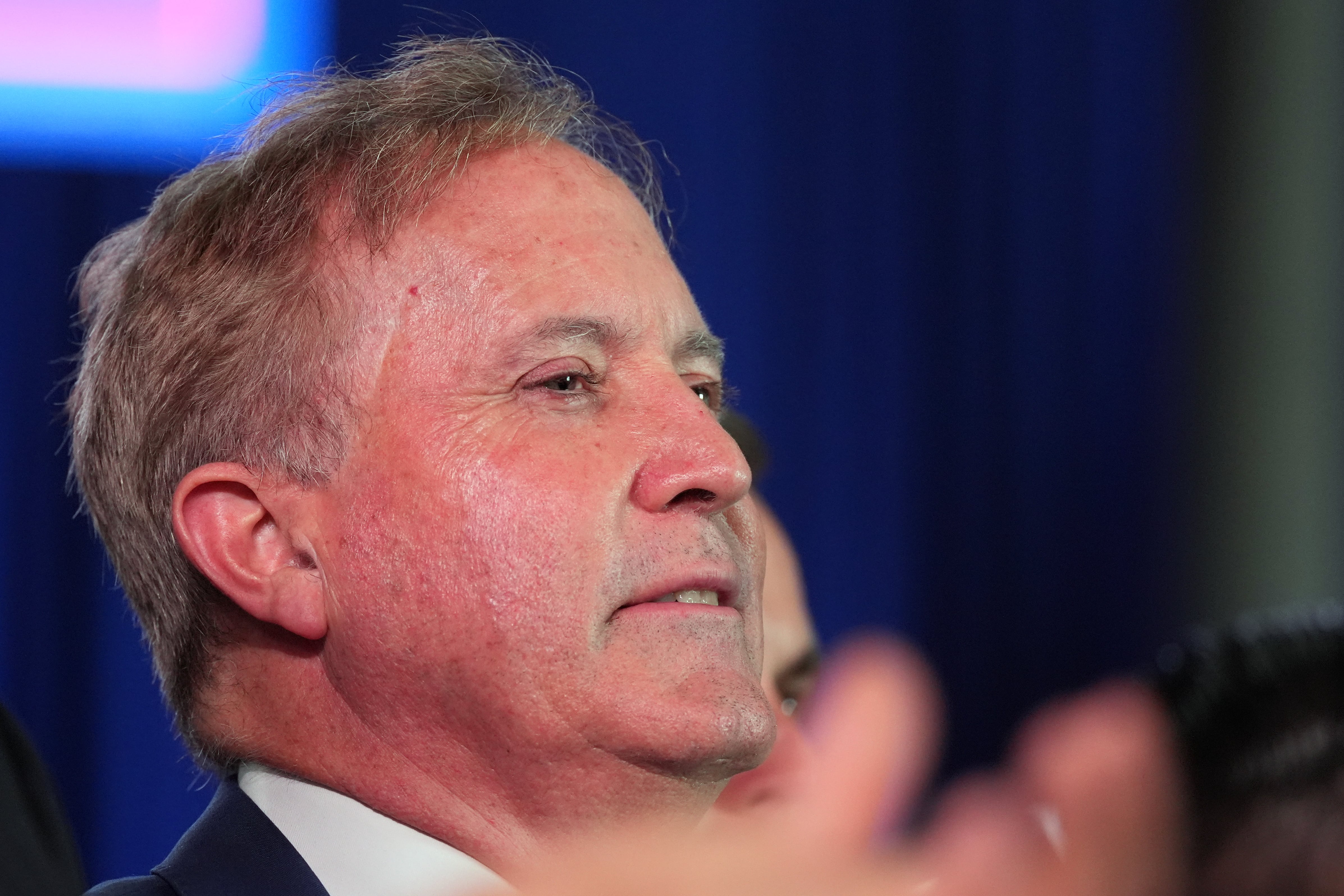 Republican U.S. Senate candidate Texas Attorney General Ken Paxton listens as President Donald Trump speaks at a campaign rally at the Port of Corpus Christi, Tuesday, in Corpus Christi, Texas. The question of personality over policy has become elevated in the state's U.S. Senate race.