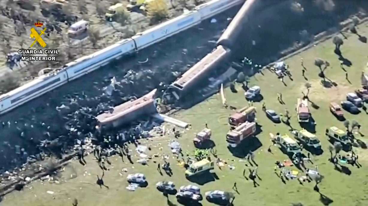 An aerial view of carriages and first responders on the site of a collision between two trains in Urda, Spain, Wednesday. At least 68 people have been killed in the collision so far.