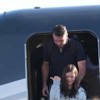 Defeated presidential candidate Flávio Bolsonaro and his family land in Miami after fleeing Brazil