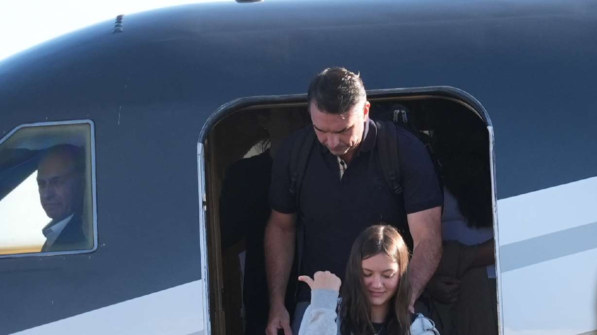 Flávio Bolsonaro arrives at Miami-Opa Locka Executive Airport on Wednesday, in Opa-locka, Fla. Bolsonaro and his family fled Brazil after losing Sunday's presidential election to incumbent President Luiz Inacio Lula da Silva.