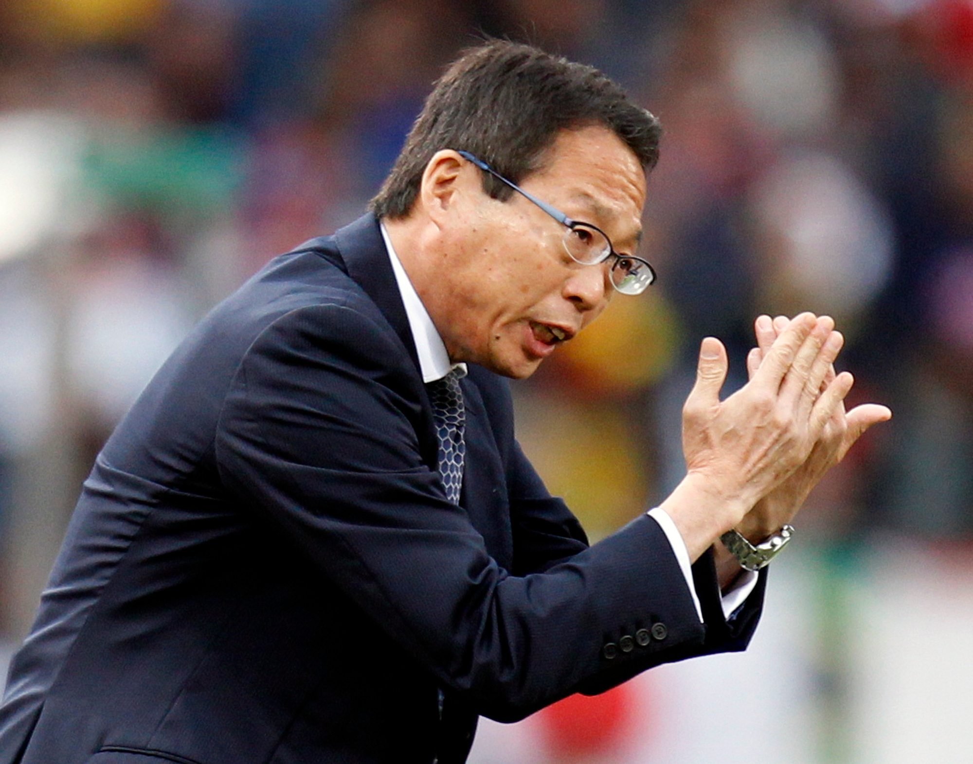 FILE - Japan head coach Takeshi Okada gestures during the World Cup round of 16 soccer match between Paraguay and Japan at the Loftus Versfeld Stadium in Pretoria, South Africa, Tuesday, June 29, 2010. 
