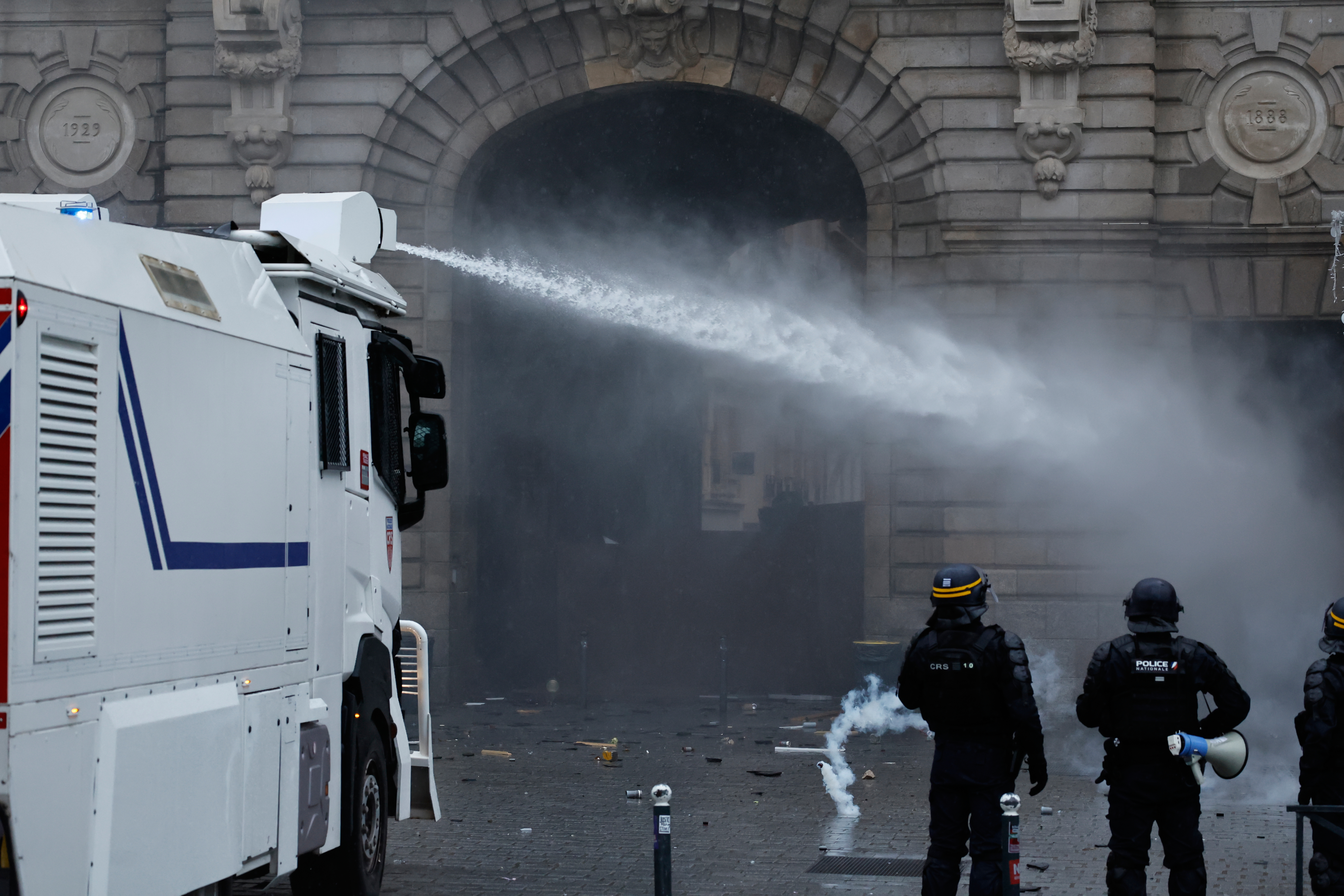 Police use a water cannon after a demonstration against rising living costs in Rennes, France, Saturday, Oct. 24, 2026. 
