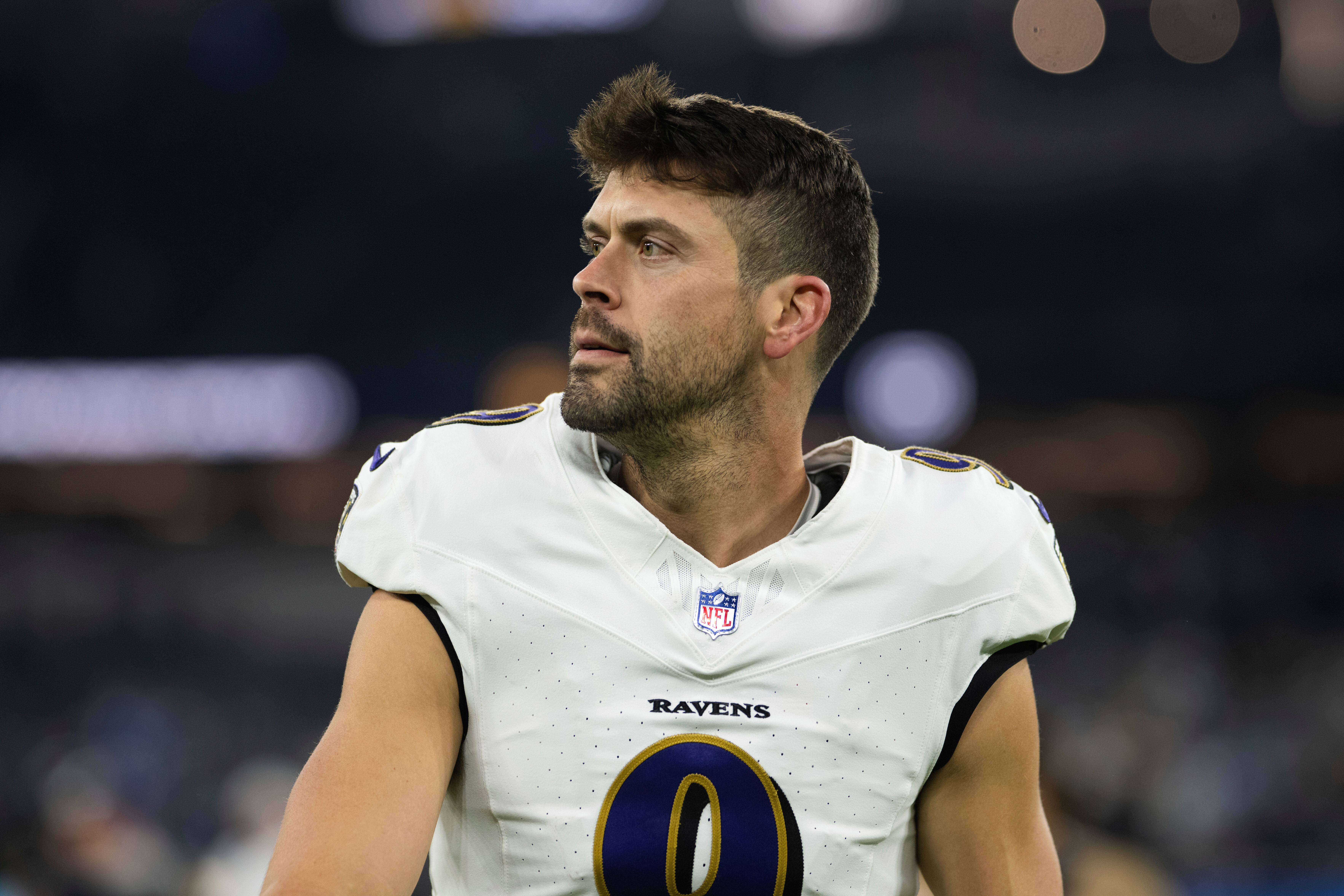 FILE - Baltimore Ravens place kicker Justin Tucker walks back to the locker room after an NFL football game against the Los Angeles Chargers, Nov. 25, 2024, in Inglewood, Calif. 