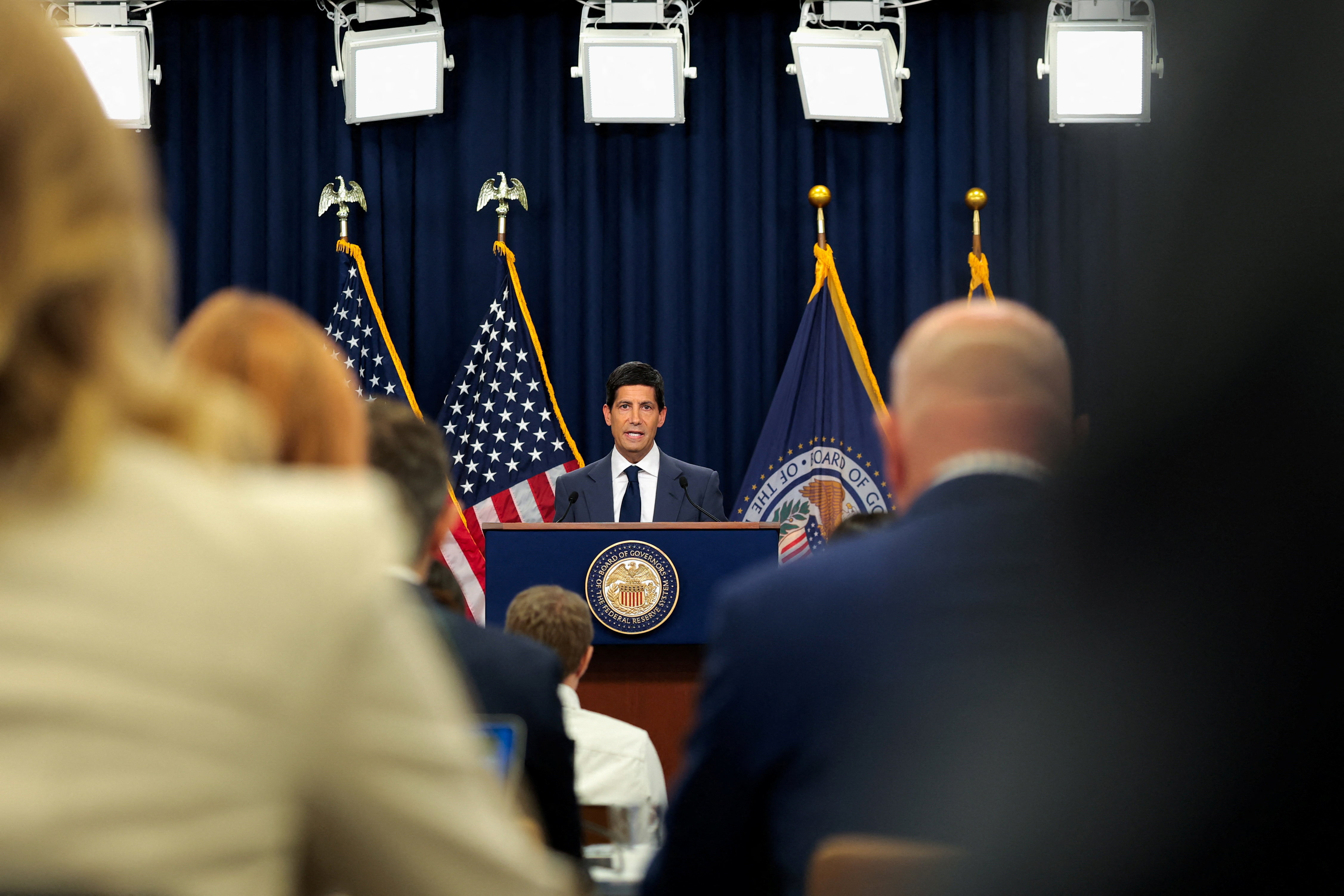 Federal Reserve Chair Kevin Warsh holds a press conference, following a two-day meeting of the Federal Open Market Committee in Washington, Wednesday. The Fed held interest rates steady, as expected.