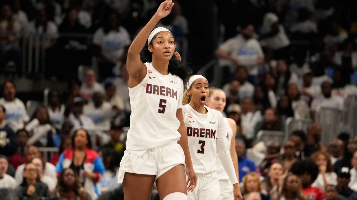 Atlanta Dream forward Angel Reese (5) and Atlanta Dream guard Jordin Canada (3) react to a foul in the second half during Game 4 of the WNBA basketball finals on Saturday, Oct. 24, 2026, in Atlanta.