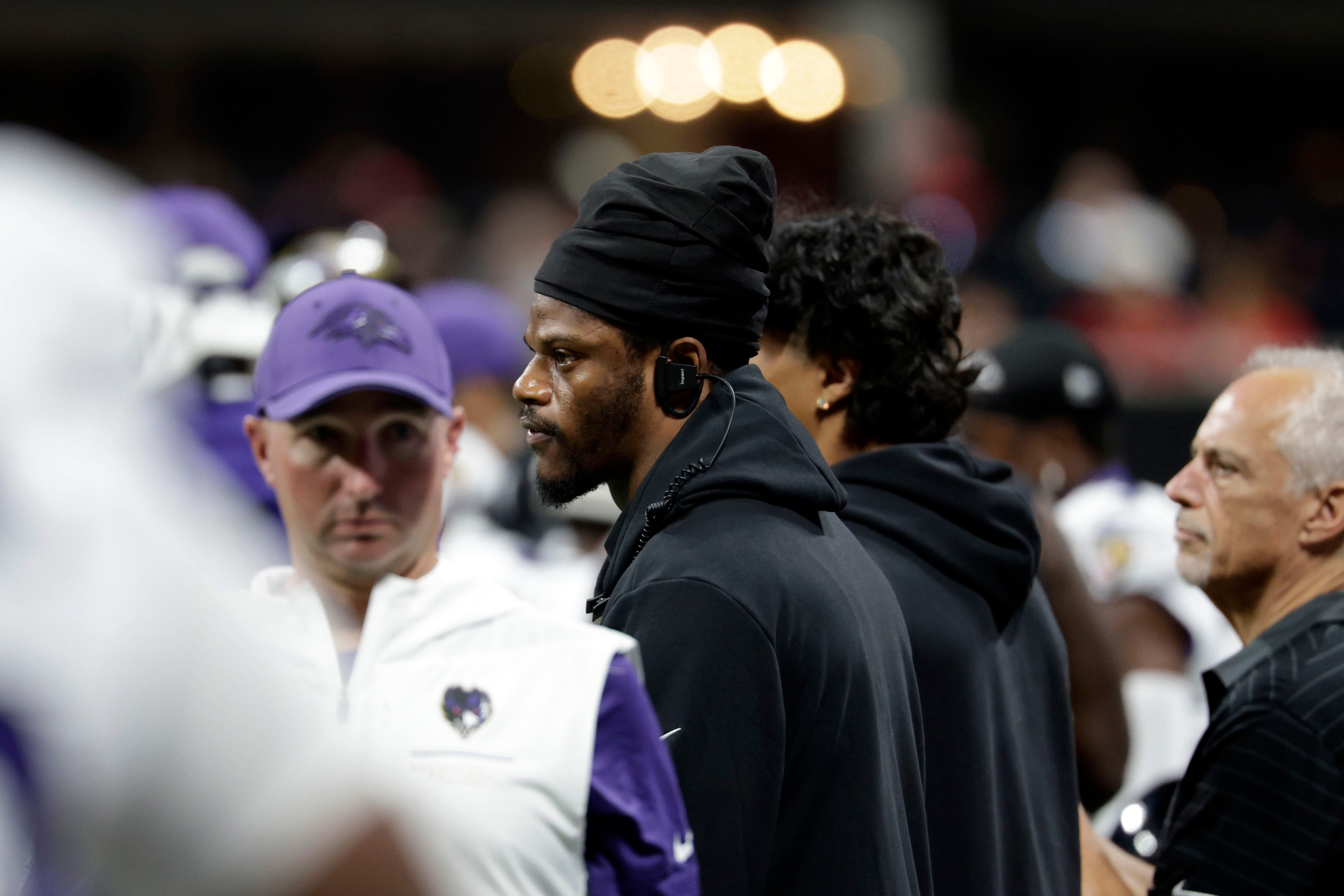 Injured Baltimore Ravens quarterback Lamar Jackson watches from the sideline during the first half of an NFL football game against the Atlanta Falcons, Sunday, Oct. 11, 2026, in Atlanta. 