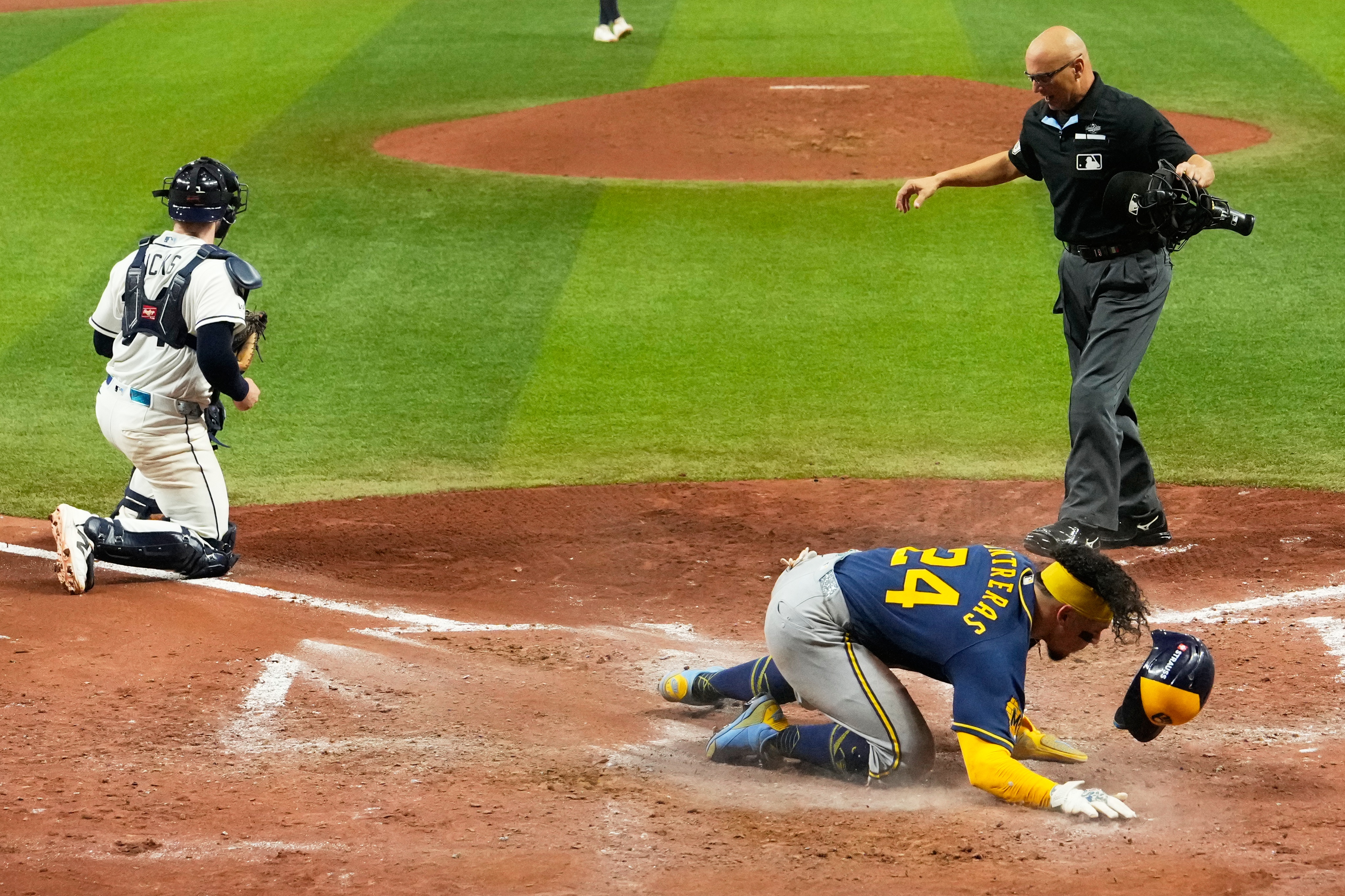 Milwaukee Brewers' William Contreras celebrates after scoring during the sixth inning of Game 5 of baseball's World Series, Wednesday, Oct. 28, 2026, in St. Petersburg, Fla., between the Milwaukee Brewers and the Tampa Bay Rays. 