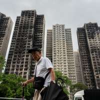 Hong Kong's housing minister resigns after fire investigation finds inadequate oversight