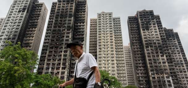 Hong Kong's housing minister resigns after fire investigation finds inadequate oversight