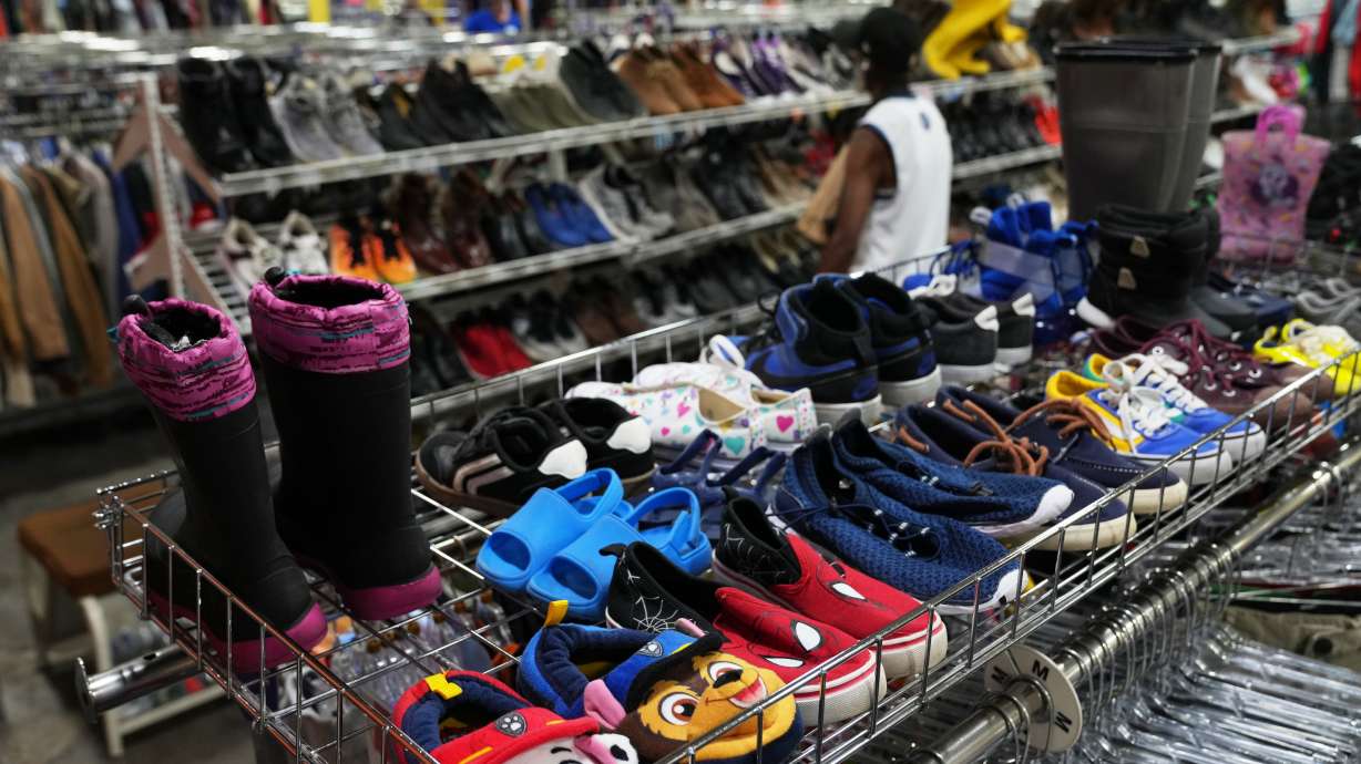 The children's shoe section is seen at a Goodwill store in Roseville, Minn., Aug. 12. An inflation gauge closely monitored by the Federal Reserve accelerated last month, showing that prices remain elevated less than a week before midterm elections.
