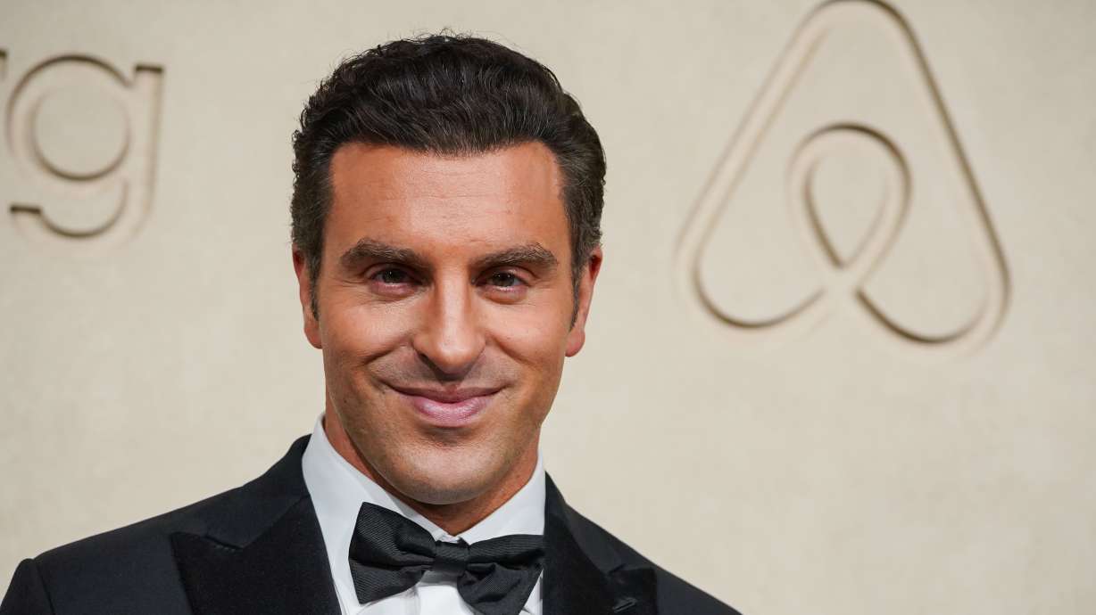 Airbnb CEO Brian Chesky arrives at the Airbnb Gala on Wednesday at Milk Studios in Los Angeles. The company plans to dedicate $500 million over the next five years to increase temporary housing support.