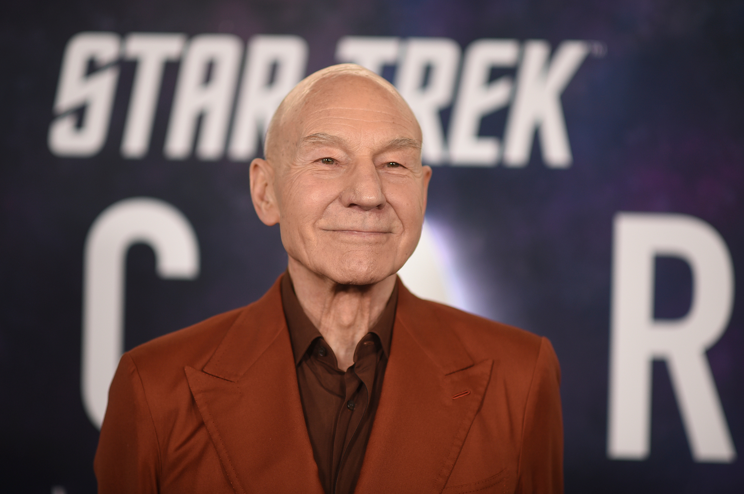 Patrick Stewart arrives at the premiere of the third and final season of "Star Trek: Picard" on Feb. 9, 2023, in Los Angeles. Stewart died on Wednesday at the age of 86.