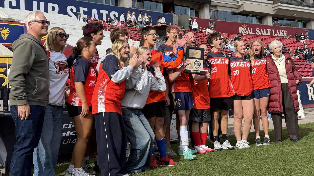 Brighton High School's Unified Soccer team celebrates a state championship win on Thursday at the Special Olympics Unified Soccer State Tournament. Hundreds of high school students spent their Thursday at America First Field, cheering on athletes competing in the sixth annual Special Olympics Unified Sports Soccer State Championships.