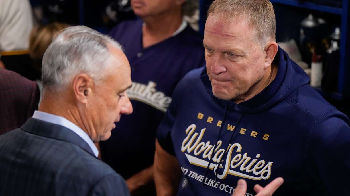 MLB Commissioner Rob Manfred, left, speaks with Milwaukee Brewers manager Pat Murphy prior to Game 1 of baseball's World Series, Friday, Oct. 23, 2026, in Milwaukee, between the Milwaukee Brewers and the Tampa Bay Rays.