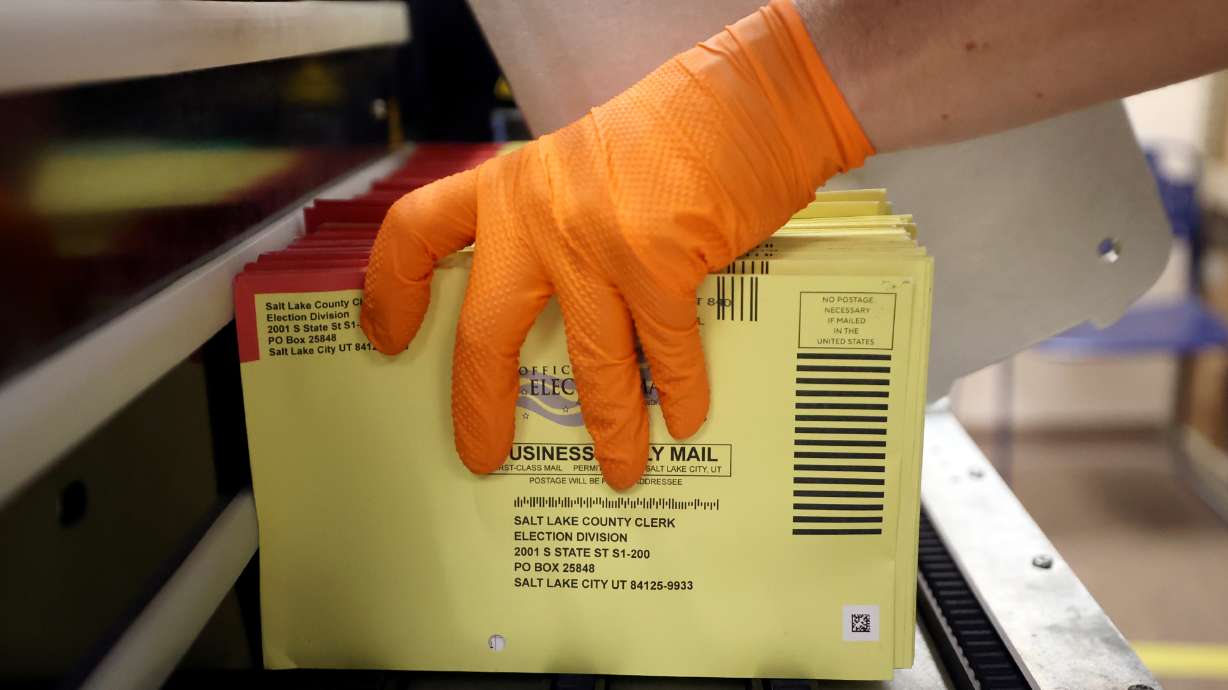 Tim Schorzman, Salt Lake County elections asset coordinator, operates the Agilis ballot sorting machine at the Salt Lake County Government Center in Salt Lake City on Tuesday.