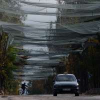 A rare Russia-Ukraine truce allows a humanitarian mission to reach the stricken city of Oleshky