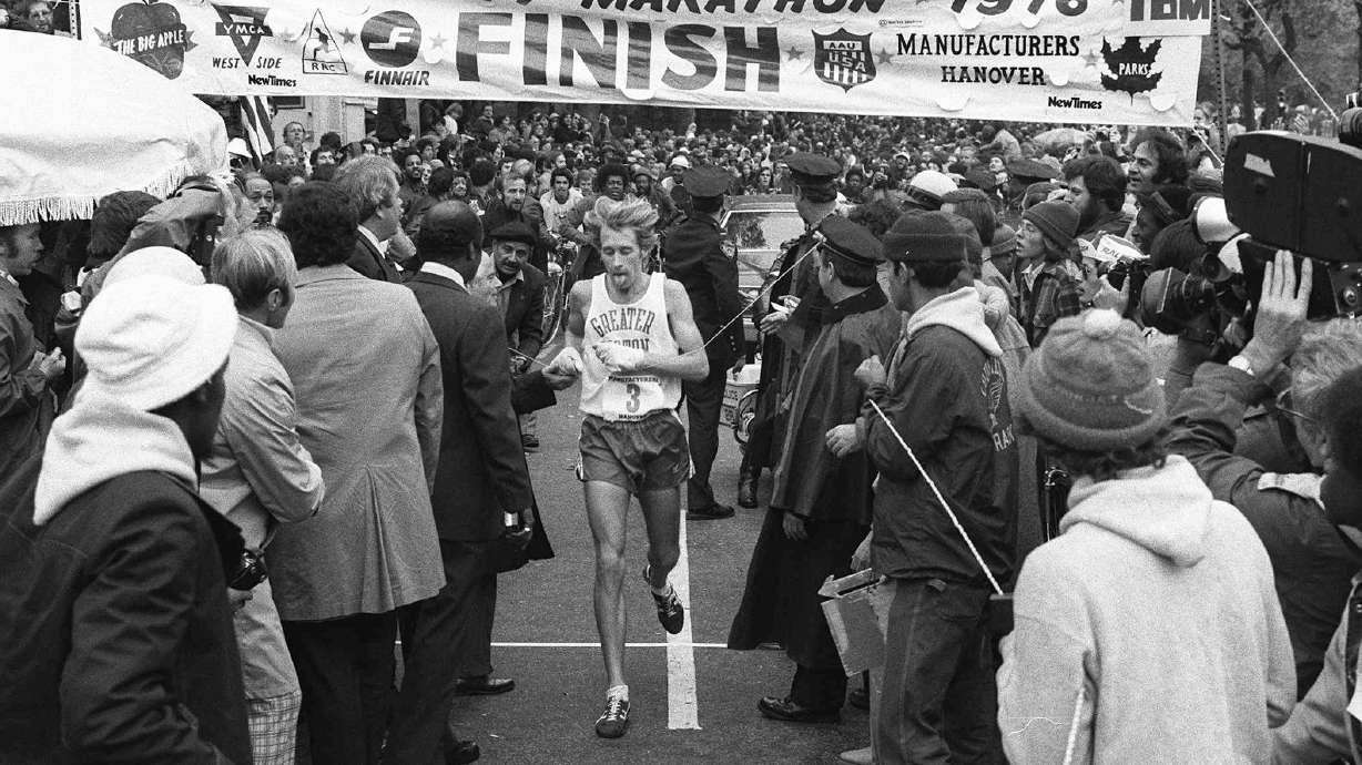 FILE - Bill Rodgers, of Melrose, Mass., crosses the finish line to win the New York City Marathon, Sunday, Oct. 24, 1976.