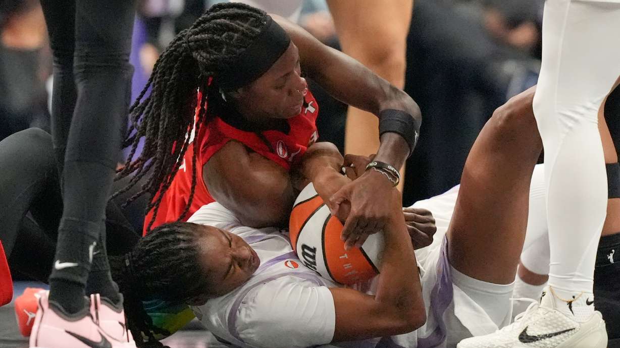 Atlanta Dream's Rhyne Howard, top, and Golden State Valkyries' Tiffany Hayes battle for the ball during the second half of Game 6 of the WNBA basketball finals on Thursday, Oct. 29, 2026, in Atlanta.