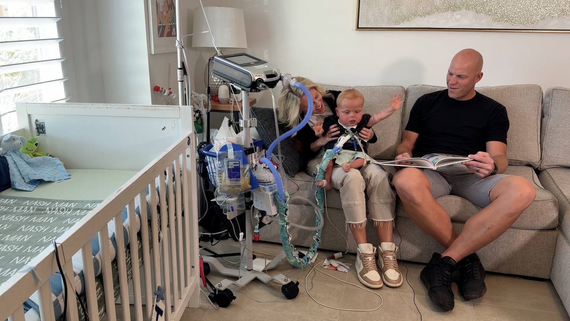 Two-year-old Nash and his parents Lindee and Jordan Stone. Nash relies on a ventilator to help him breathe due to complications from him being born prematurely.