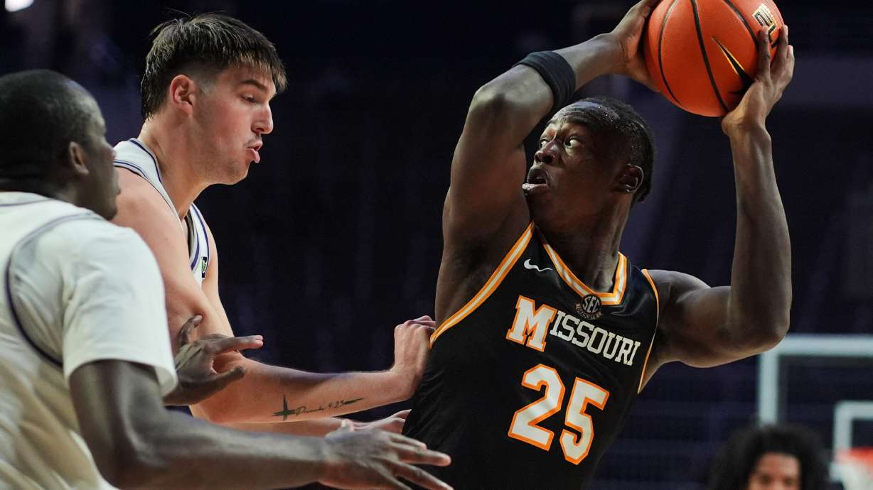 Missouri's Mark Mitchell (25) shoots over Kansas State's Brock Vice during the first half of an exhibition NCAA college basketball game Friday, Oct. 23, 2026, in Manhattan, Kan.