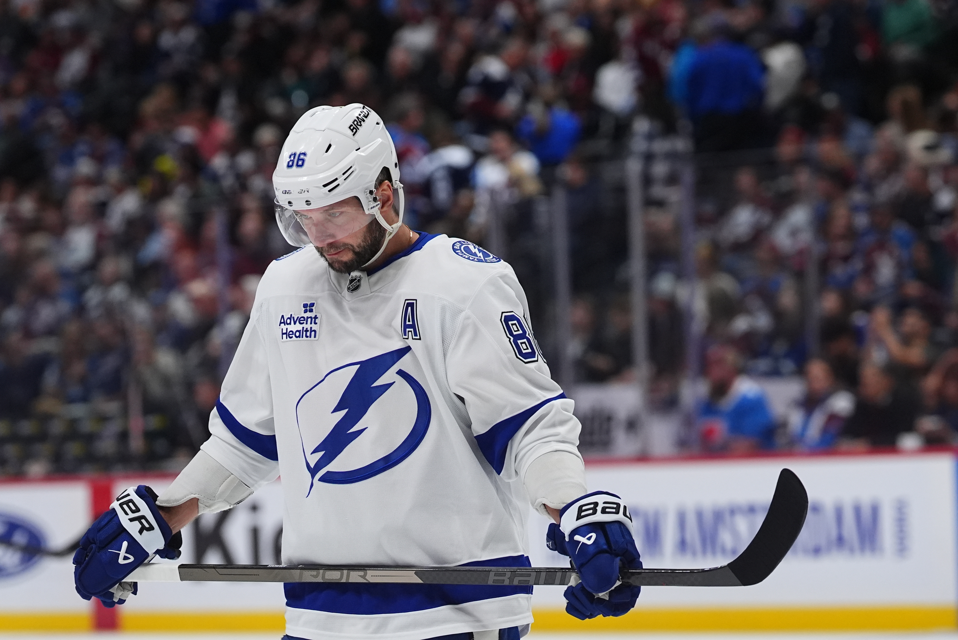 Tampa Bay Lightning right wing Nikita Kucherov waits for a face-off in the first period of an NHL hockey game against the Colorado Avalanche, Friday, Oct. 23, 2026, in Denver. 
