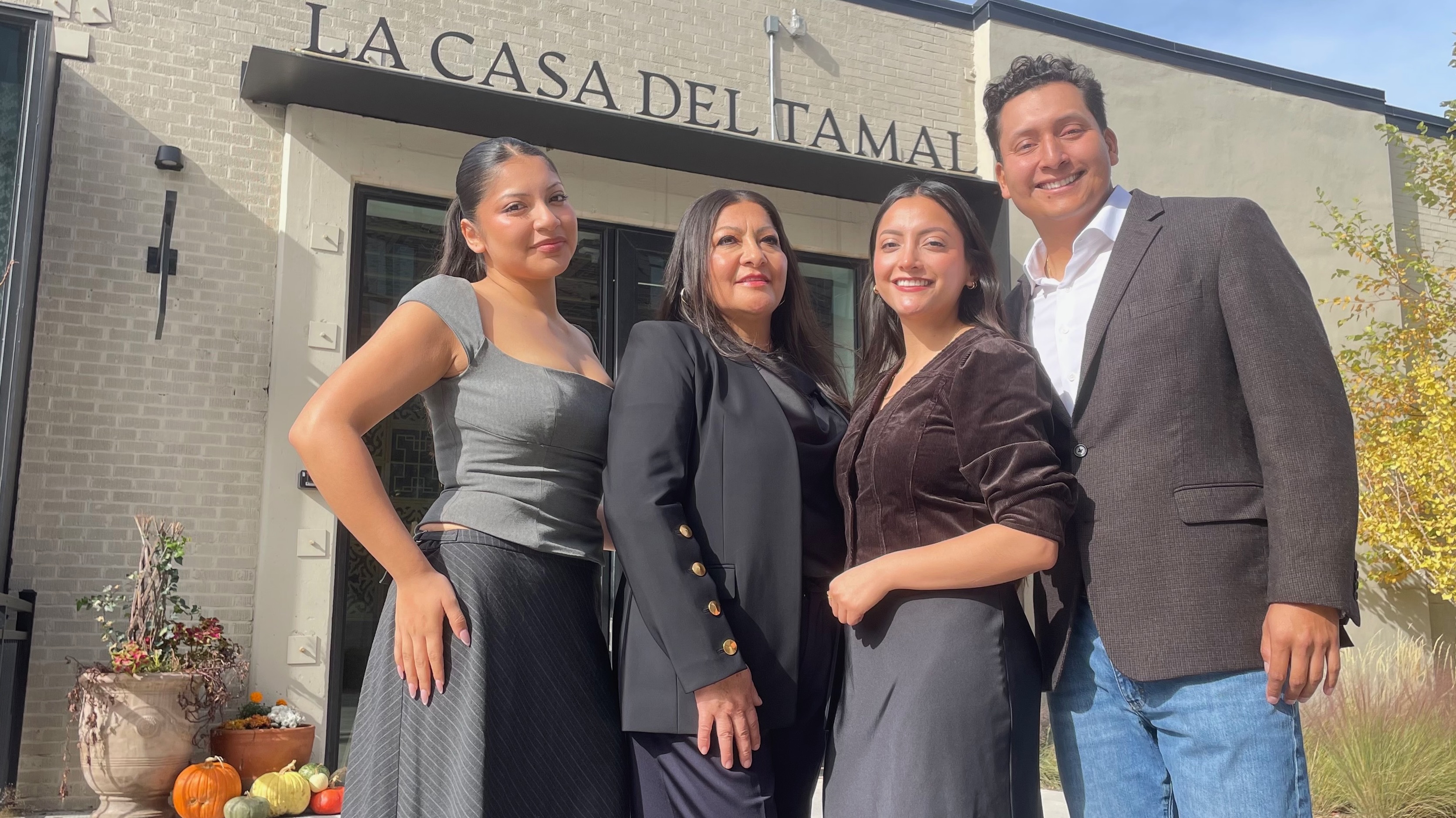 La Casa Del Tamal, where operator Cristina Olvera, second from left, puts a focus on family and tamales, drew a visit from a U.S. Small Business Administration official. Olvera and other family are pictured outside the restaurant's Salt Lake City location during the visit on Thursday.