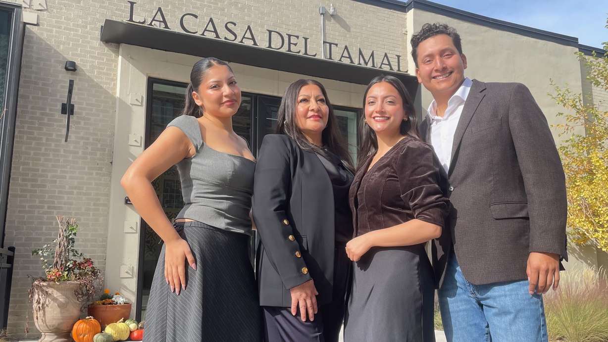 La Casa Del Tamal, where operator Cristina Olvera, second from left, puts a focus on family and tamales, drew a visit from a U.S. Small Business Administration official. Olvera and other family are pictured outside the restaurant's Salt Lake City location during the visit on Thursday.