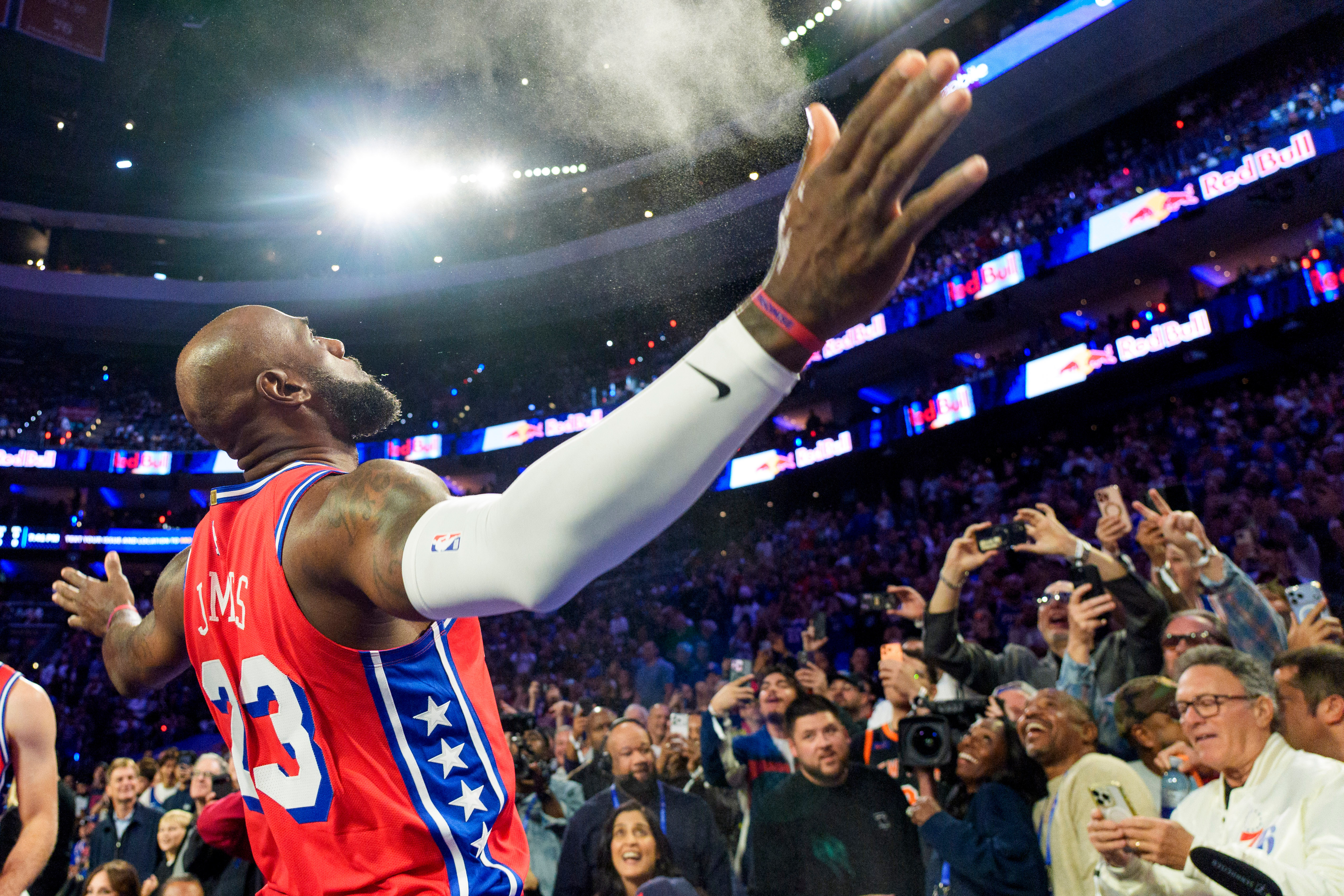 Philadelphia 76ers' LeBron James (23) does his chalk toss prior to an NBA Cup basketball game against the New York Knicks, Friday, Oct. 30, 2026, in Philadelphia. 