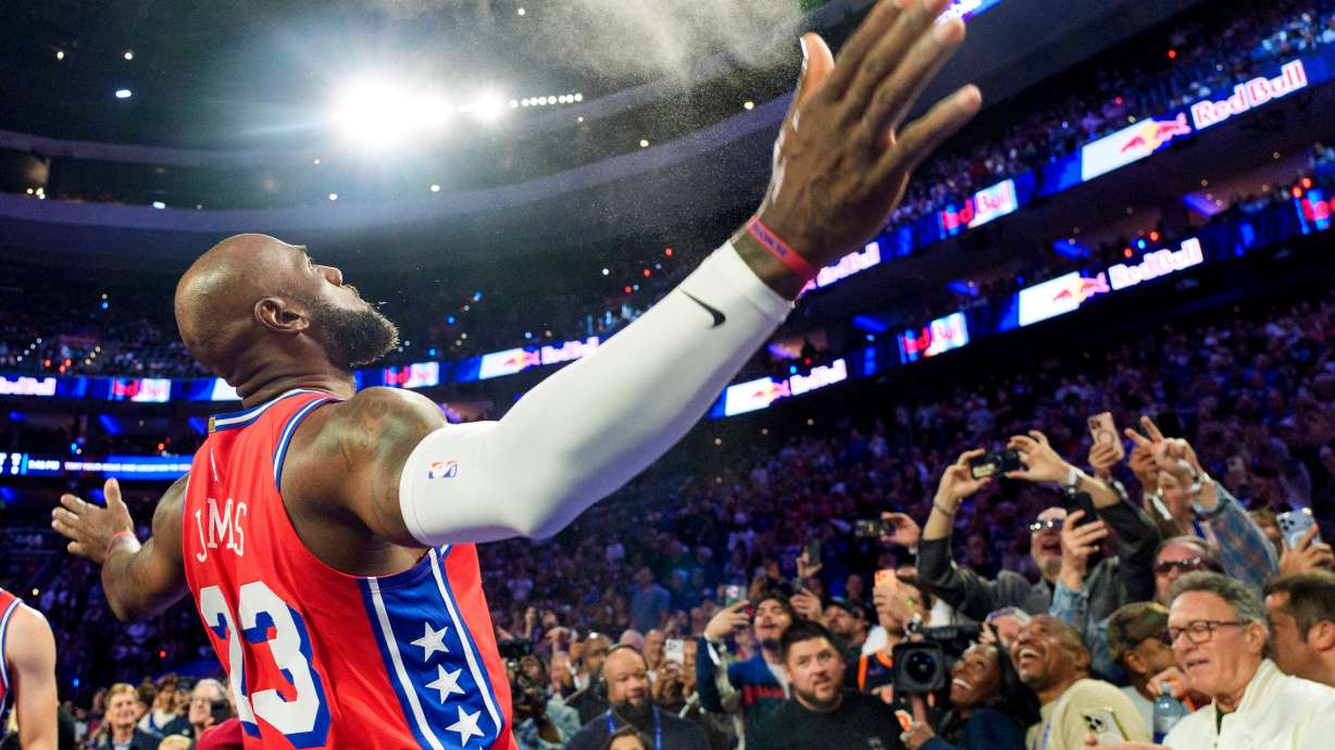 Philadelphia 76ers' LeBron James (23) does his chalk toss prior to an NBA Cup basketball game against the New York Knicks, Friday, Oct. 30, 2026, in Philadelphia.