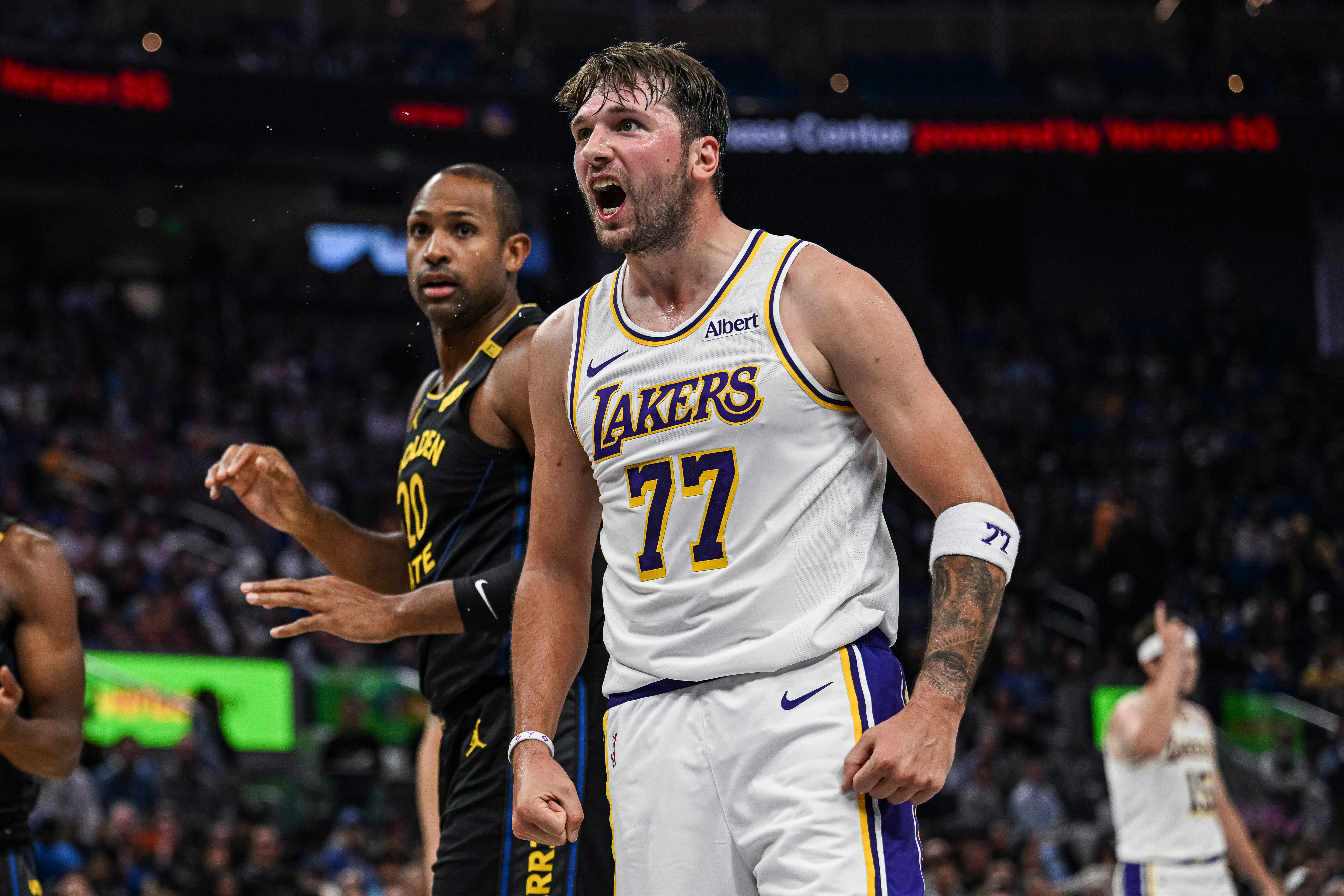 Stephen Curry scores 31 points and outduels Luka Doncic as Warriors come back to beat Lakers 112-95