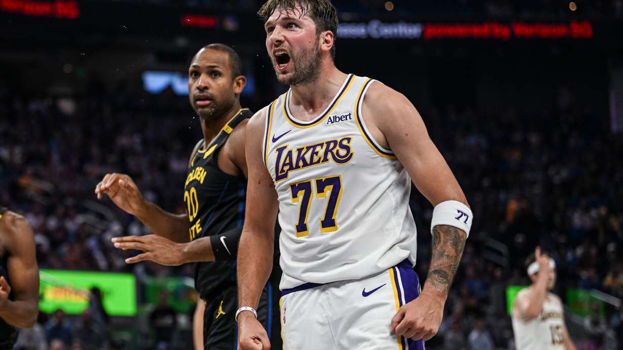 Los Angeles Lakers guard Luka Doncic (77) reacts during the first half of an NBA Cup basketball game against the Golden State Warriors, Saturday, Oct. 30, 2026, in San Francisco.