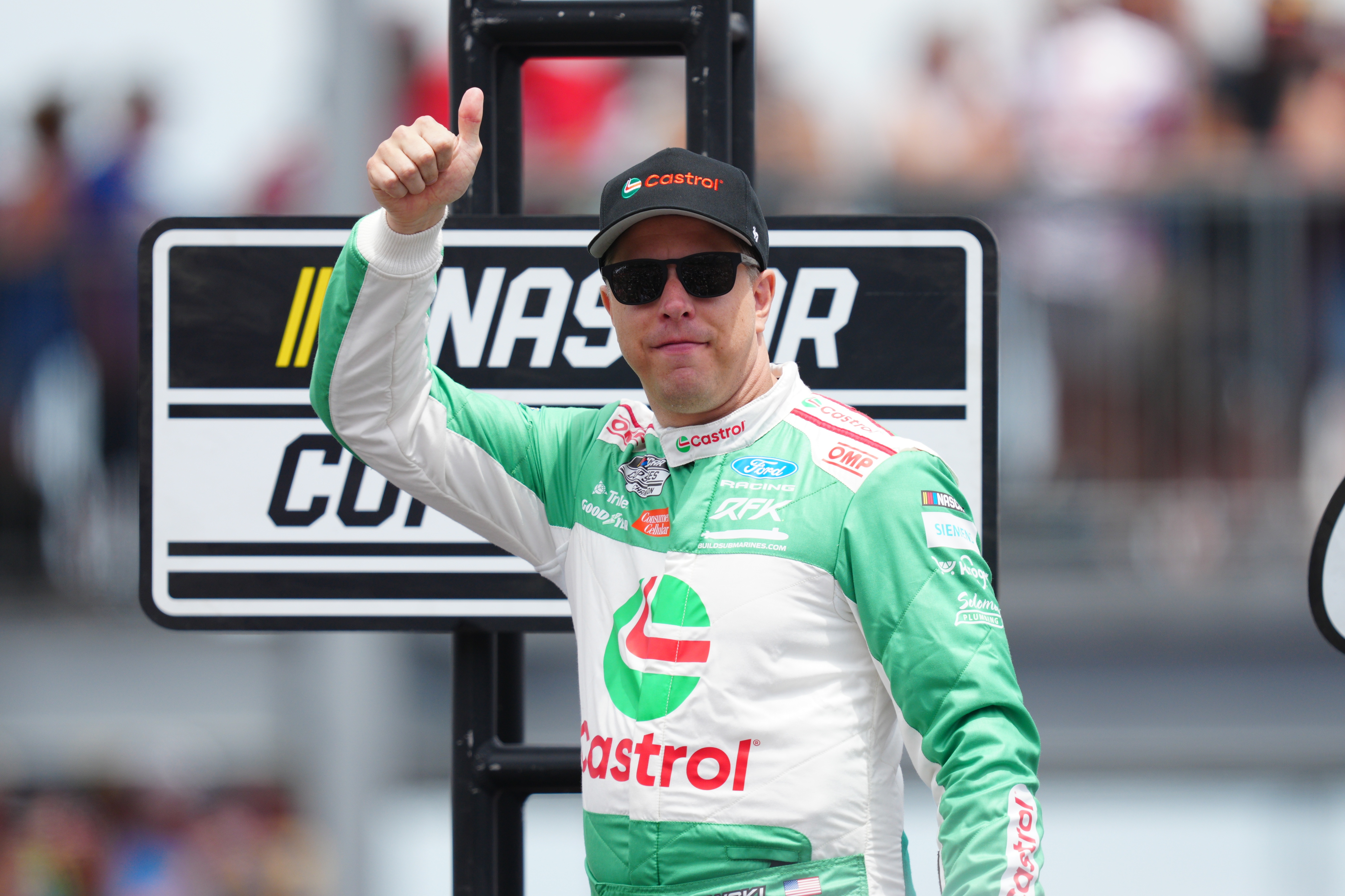 FILE - Driver Brad Keselowski gives a thumbs up at the NASCAR Cup Series auto race at Pocono Raceway, Sunday, June 14, 2026, in Long Pond, Pa. 