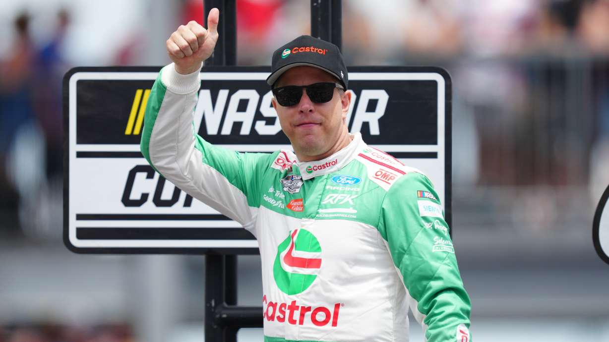 FILE - Driver Brad Keselowski gives a thumbs up at the NASCAR Cup Series auto race at Pocono Raceway, Sunday, June 14, 2026, in Long Pond, Pa.