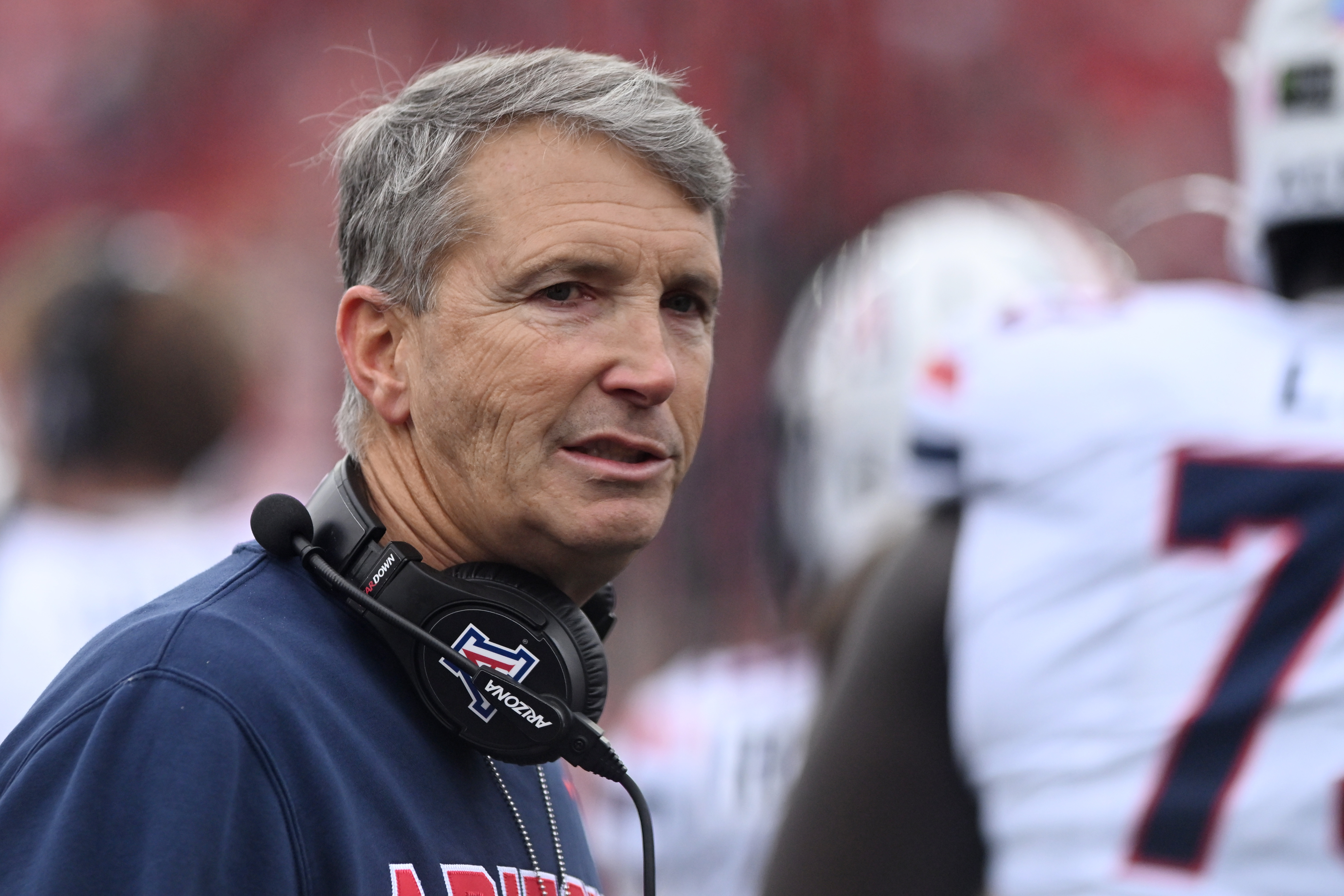 Arizona head coach Brent Brennan walks along the sidelines during the first half of an NCAA college football game against Texas Tech, Saturday, Oct. 31, 2026, in Lubbock, Texas. 