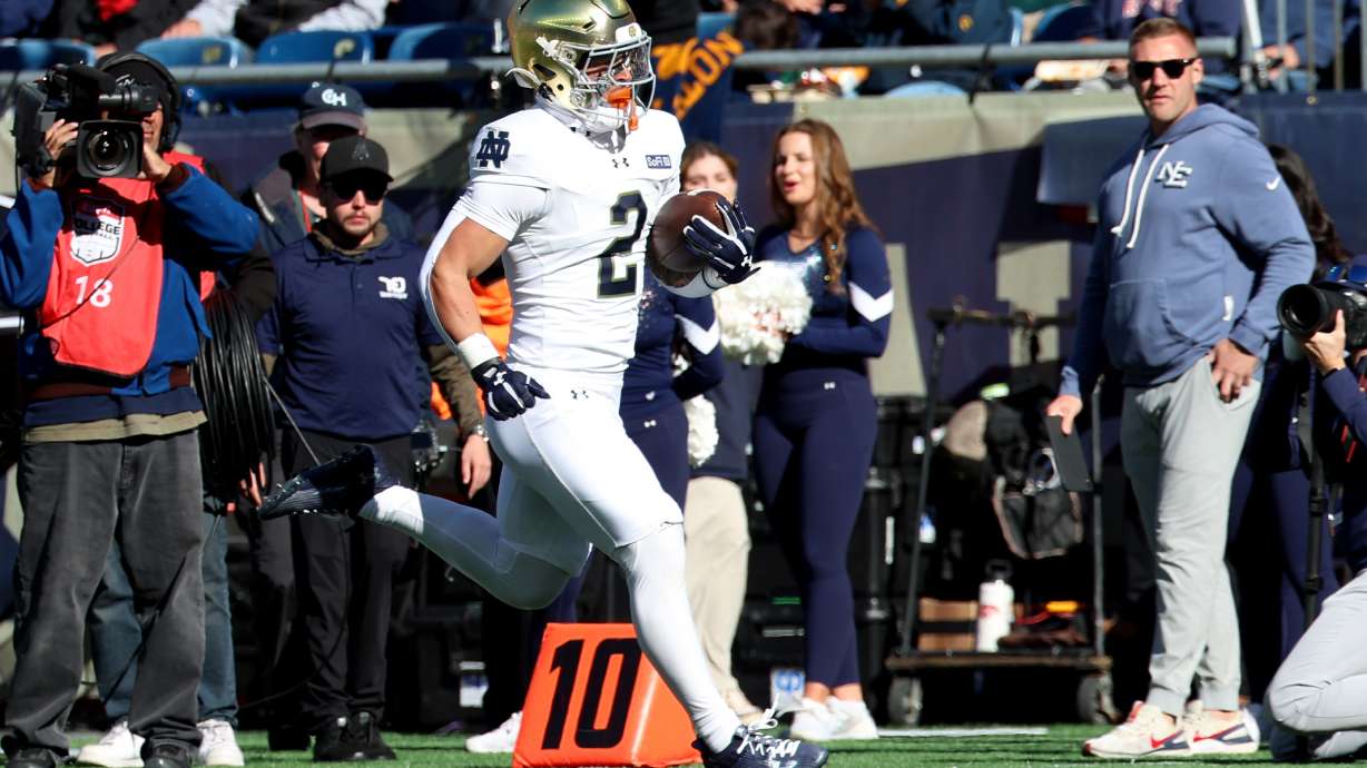 Notre Dame running back Nolan James Jr. (2) runs in for a touchdown during the first half of an NCAA college football game against Navy, Saturday, Oct. 31, 2026 in Foxborough, Mass.