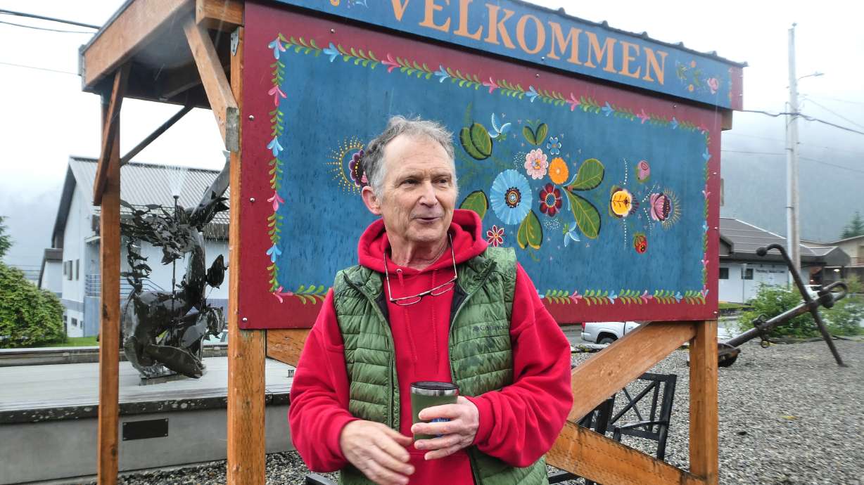 Dan J. Sullivan, a candidate in Alaska's U.S. Senate race who shares a name with the incumbent seeking reelection, talks in front of a welcome sign near downtown Petersburg, Alaska, July 3.