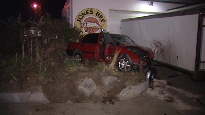 Car Slams Into Building; Three People Injured