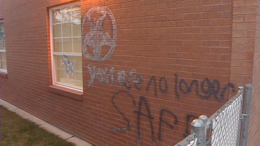 Seminary building covered with hateful messages