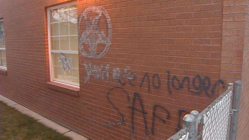 Seminary building covered with hateful messages