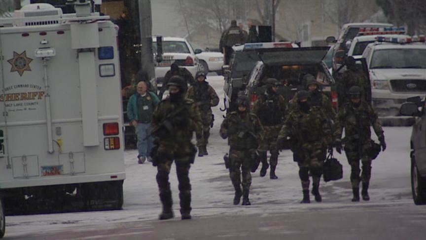 Barricaded man coaxed out by mother