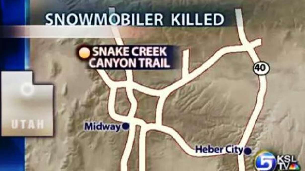 Woman killed in snowmobile accident