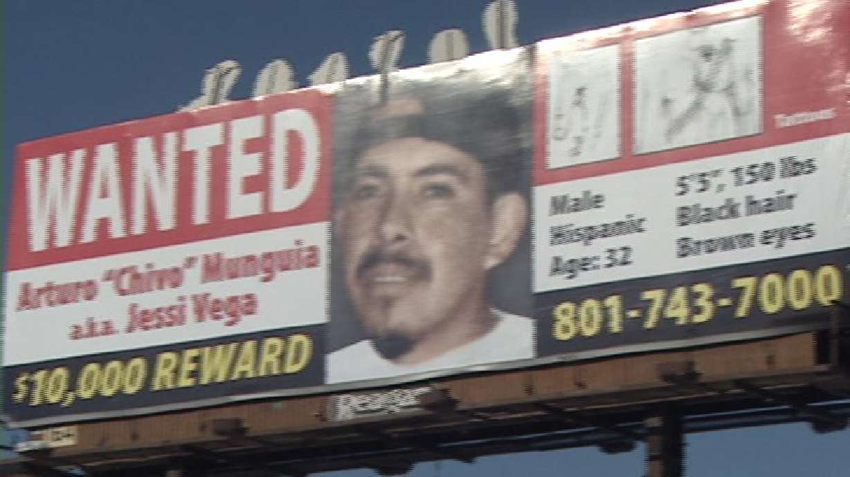 Family hopes billboard will help find murder suspect