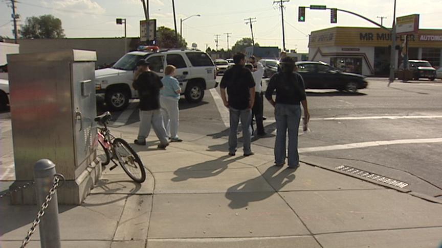 Woman on Bike Hit at Light