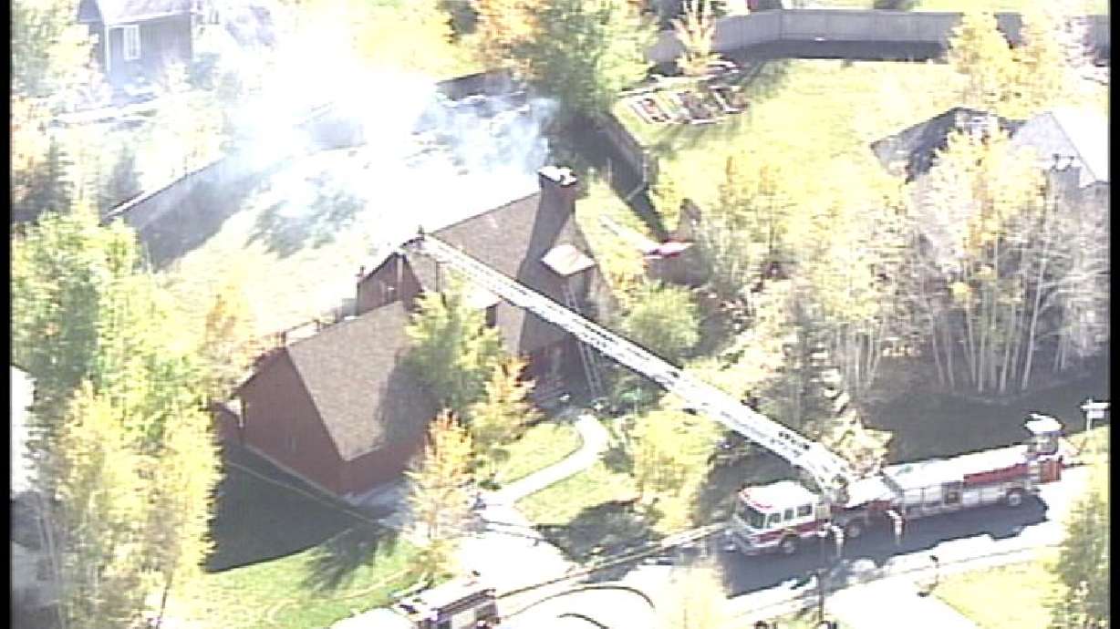 Crews Battle House Fire, Rescue Dog