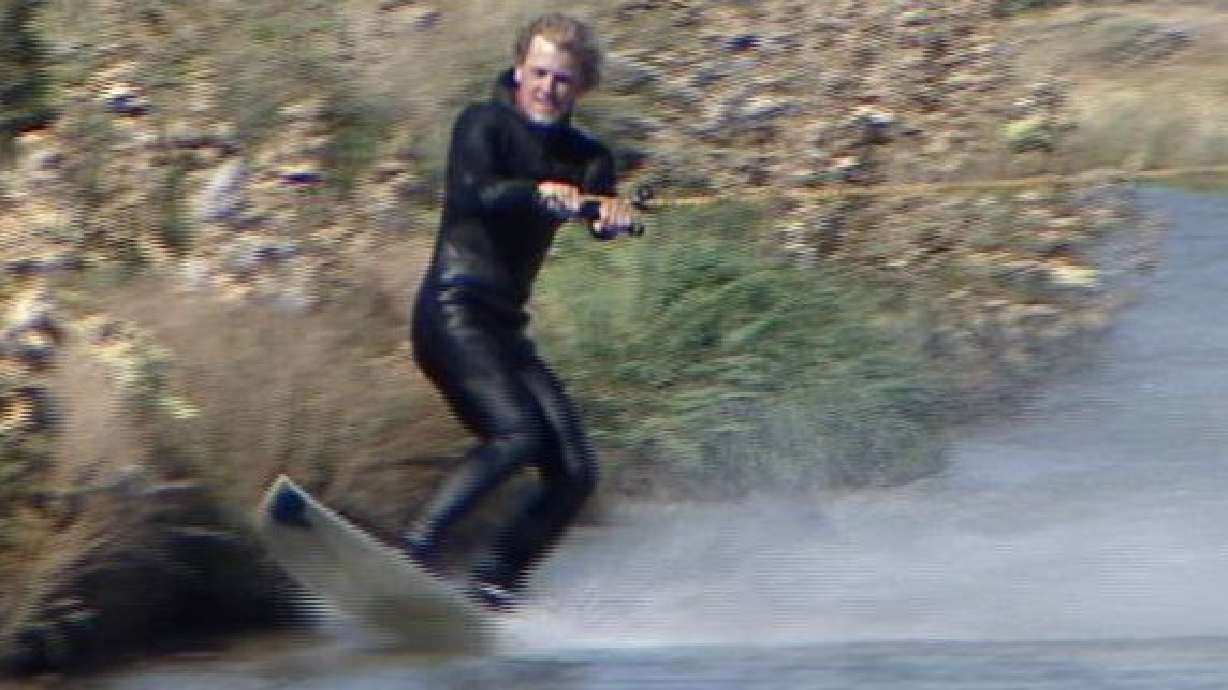 Australian Surfers Ride the Waves in Bluffdale Canal